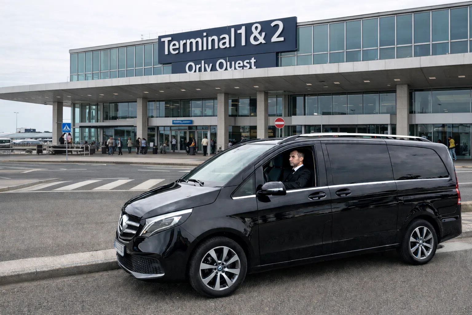 Point de rendez-vous VTC Orly 1 et Orly 2 - hall arrivées chauffeur privé pancarte